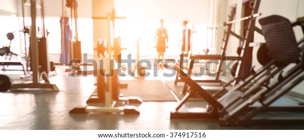 blurred-fitness-gym-background-banner-600w-374917516.webp
